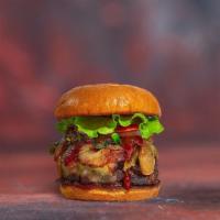 Veggie Bbq Bliss Burger · Seasoned vegetarian patty topped with melted cheese, barbecue sauce, lettuce, tomato, onion,...