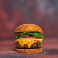 Cheese And Daze Veggie Burger · Seasoned vegetarian patty topped with melted cheese, lettuce, tomato, onion, and pickles. Se...