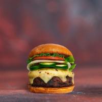 Hot Shot Jalapeno Veggie Burger · Seasoned vegetarian patty topped with melted cheese, jalapenos, lettuce, tomato, onion, and ...