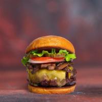 M&C Collaboration Veggie Mushroom · Seasoned vegetarian patty topped with mushrooms, melted cheese, lettuce, tomato, onion, and ...