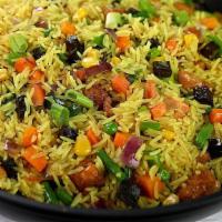 Fried Rice With Mixed Vegetables. · Fried yellow rice served with diced carrots, peas, and corn. Please specify if you're allerg...