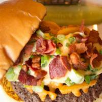 The Villager Burger · signature Angus beef blend, waffle fries, gouda cheese sauce, bacon, scallions. 

Consumptio...