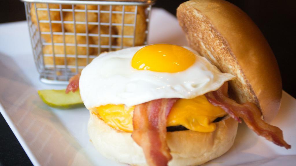 Breakfast Burger · signature Angus beef blend, American, over easy egg, bacon, toasted English muffin. 

Consumption of under-cooked meat, poultry, eggs, or seafood may increase the risk of foodborne illness. Especially if you have certain medical conditions.