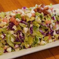 Joe’S Chopped Salad · Romaine red cabbage,tomatoes,white cabbage,candy peanuts and feta cheese chopped fine.