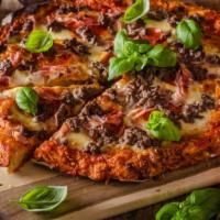 Vegan Meat Lover'S Pizza · Delicious Vegan Pizza topped with vegan cheese, vegan meats, and special seasoning.