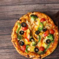 Vegan Veggie Galore Pizza · Delicious 14 inch Vegan Pizza, topped with Vegan cheese accompanied by onion, mushrooms, pep...