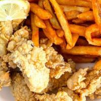 Fried Oyster Basket (10) · 10 crispy, fresh oysters. Deep fried and seasoned. Served with your choice of fries.