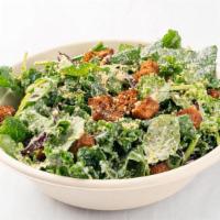 Cashew Kale Caesar Salad · mixed kale with cabbage with cashew caesar dressing and vegan cashew parmesan