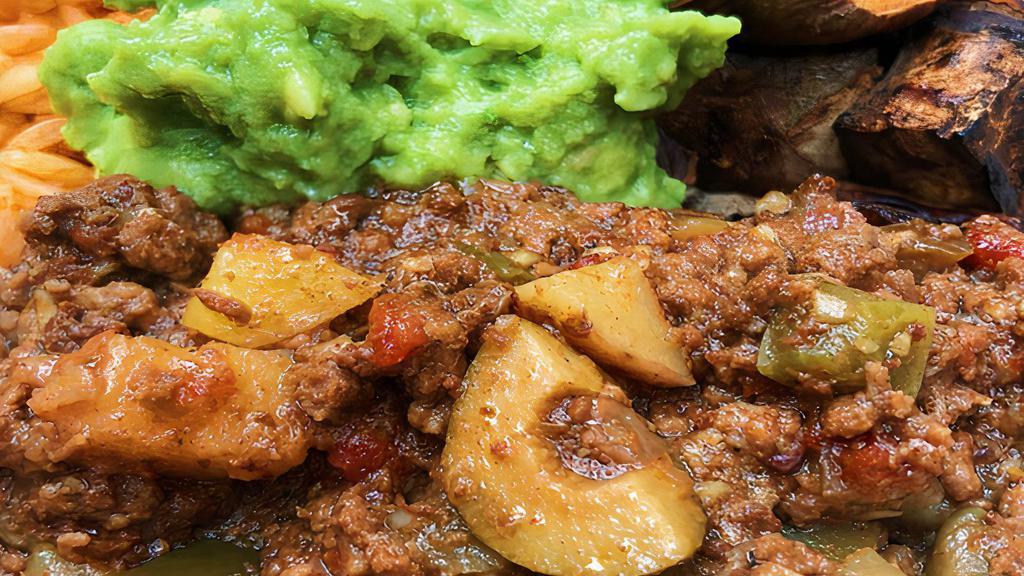 Grass-Fed Picadillo · Cuban-style 100% grass-fed beef picadillo with brown rice, sweet potato mash (contains coconut), guacamole, and hot sauce