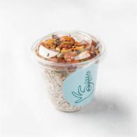 Coconut Chia Pudding · Coconut chia pudding topped with our homemade grain-free granola