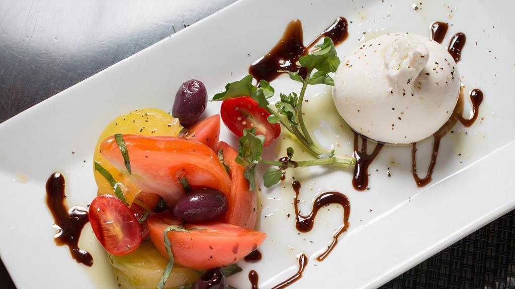 Burrata Cheese & Tomatoes · Tomatoes, basil, EVOO, balsamic glaze and fresh Mozzarella filled with cream and curds. (Gluten-Free option also available)