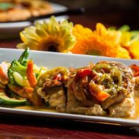 Pollo Scarpariello · Chicken strips sautéed with garlic, sausages and cherry peppers in white wine sauce served w...