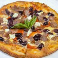 Pizza Italiana · Peppers, Goat cheese, onions, sausages, olives, and Parmesan.