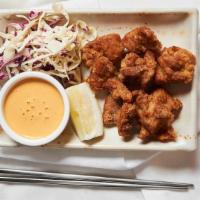 Kara-Age · Boneless fried chicken sprinkled with togorashi. Served with
spicy mayo dipping sauce and a ...