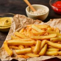 French Fries · Piping hot, thick cut salted fries are golden on the outside and fluffy on the inside.