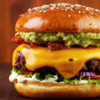 California Burger · Juicy 1/3 lb beef patty served with avocado, bacon, swiss cheese, ranch dresssing, tomatoes,...