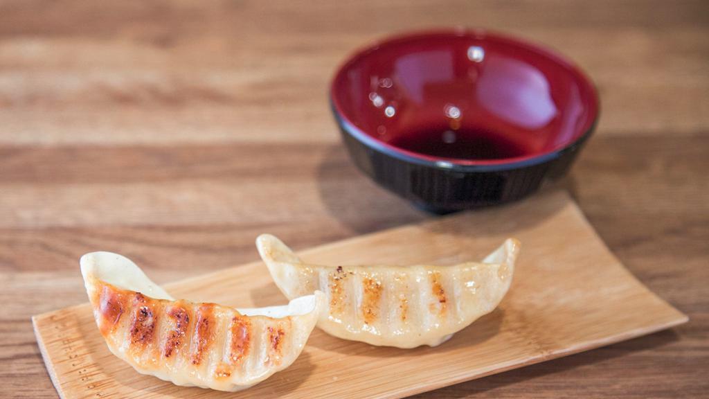Gyoza · Six pieces of fried beef or vegetable dumplings. Comes with a side of gyoza sauce.