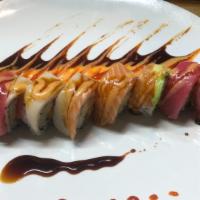 Godzilla · Variety of fish on top of shrimp tempura, spicy tuna, cucumber roll. Eel sauce, spicy mayo.