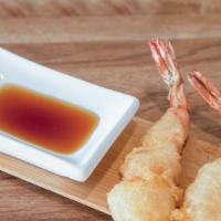 Shrimp Tempura · Fried shrimp tempura and cucumber. Topped with eel sauce.