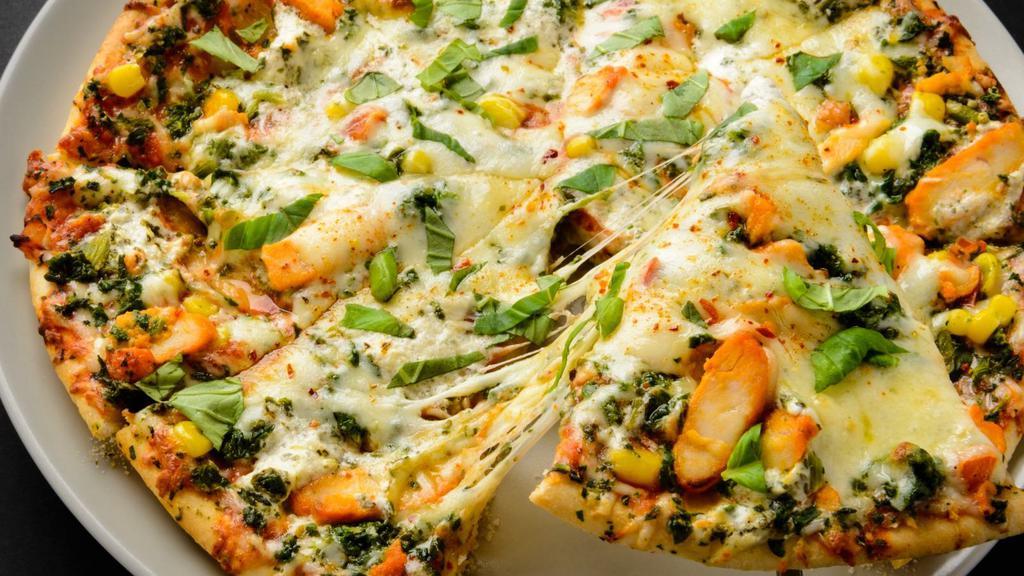 The Alfredo Special Pizza · White sauce, broccoli, chicken and topped with mozzarella.