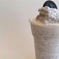 Cookies & Cream Milkshake · Creamy Cookies & Cream milkshake topped with whipped cream.