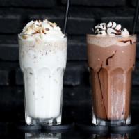 Black & White Milkshake · Vanilla & Chocolate swirled milkshake topped with whipped cream.