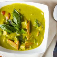 Green Curry · A spicy curry made with cream of coconut.