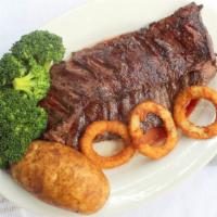 Broiled Romanian Steak · Served with soup or salad, potato and vegetable.