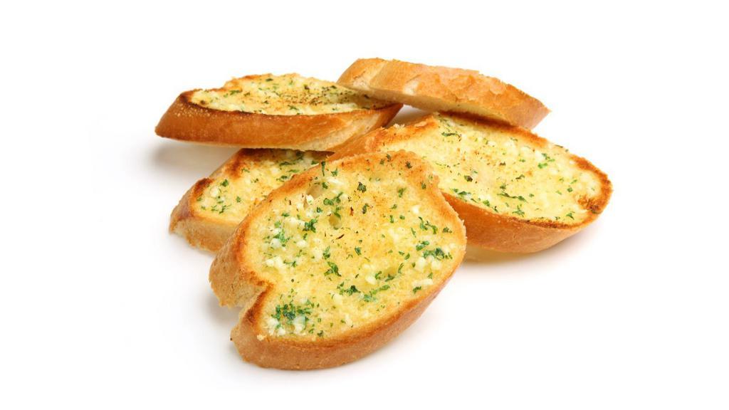Garlic Bread · Fluffy loaf bread garnished in butter, parmesan cheese &
garlic. Sure to delight!