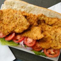 Fried Chicken Cutlet Grinder · Breaded chicken with lettuce, tomatoes, onions and mayo.