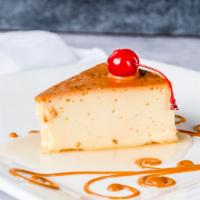Flan Slice · Flan is a baked custard dessert topped with caramel. Flan is made of eggs, sweetened condens...
