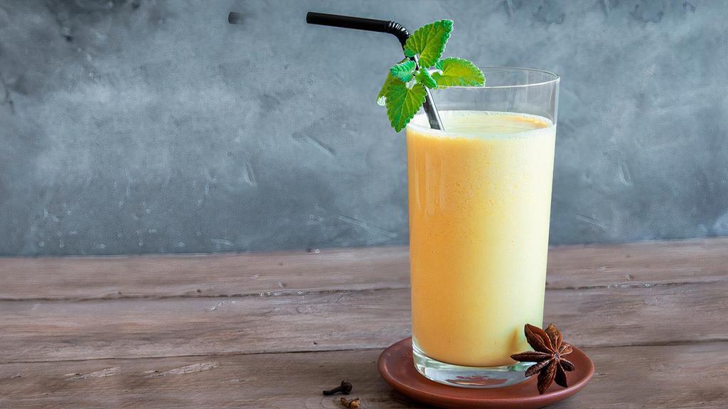 In House Special Mango Lassi · Delicious blend of mangoes and yogurt with a touch of cardamom