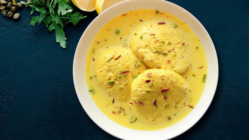 Tempting Rasmalai · Sweet juicy dumplings made from cottage or ricotta cheese soaked in sweetened, thickened milk delicately flavored with cardamom.