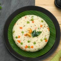 Upma · Indian polenta (cream of wheat) with onion, chilies, ginger, spices & nuts.