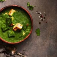 Palak Paneer · Fresh home made cubed cottage cheese & spinach cooked in cream & spices. Served with Basmati...