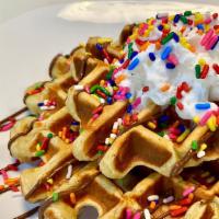 Waffles · 334 calories. 34g of protein. 24g of carbohydrates. Vitamin a. Vitamin c. Calcium. Iron.