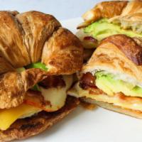 Bacon Egg & Cheese On Croissant  · choice of beef or turkey Bacon any style egg with your option of cheese on toasted Croissant