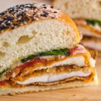 Jalapeño Chicken Parmesan Panini · Juicy and spicy chicken cutlet with jalapeños, fresh mozzarella, and tomato sauce.