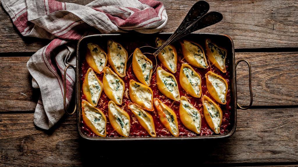Stuffed Shells · Classic ricotta stuffed shells with flavorful three-cheese ricotta filling and delicious marinara sauce.