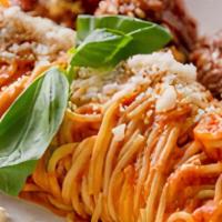Spaghetti Pomodoro · San Marzano tomato, Parmigiano-Reggiano & fresh Basil. *Gluten free pasta available. (Veg.)