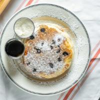 Blueberry Pancakes · Fresh blueberries baked into our old fashioned pancake batter.