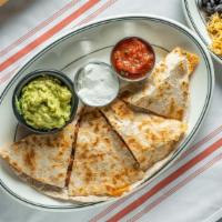 Crispy Chicken Ranch Quesadilla · Served with red onion, pepper Jack cheese and ranch dressing.