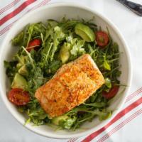 Simple Salmon Salad · Tomato, cucumber, avocado and arugula, tossed in lemon vinaigrette dressing, topped with her...