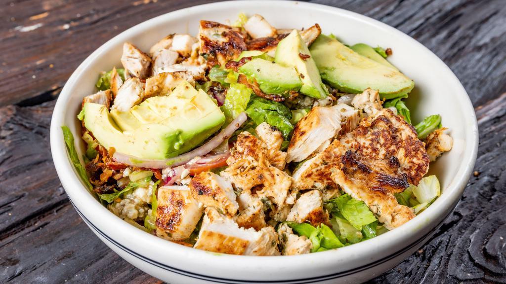 Chopped Cobb Salad · Romaine lettuce, tomatoes, egg, chicken, avocado, bacon, bleu cheese and red onion with your choice of dressing.