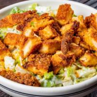 Buffalo Chicken Salad · Hand breaded and crispy fried Buffalo chicken, romaine lettuce, celery, shredded carrots and...