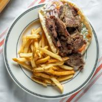 The Gyro Sandwich · Shaved beef and lamb, tomato, cucumber, red onion, Greek tzatziki sauce wrapped in a grilled...