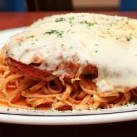Chicken Parmesan · Tender breaded chicken cutlet topped with melted mozzarella cheese, Parmesan and our housema...