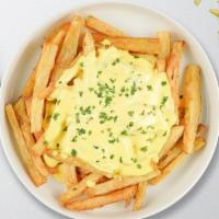 Cue In Cheese Fries · (Vegetarian) Idaho potato fries cooked until golden brown topped with melted cheese.