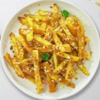 Garlic Melts Fries · (Vegetarian) Melted cheese, garlic, cream cheese, and garlic topped on Idaho potato fries.