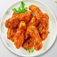 Bbq Babe Tenders · Chicken tenders breaded and fried until golden brown before being tossed in barbecue sauce.